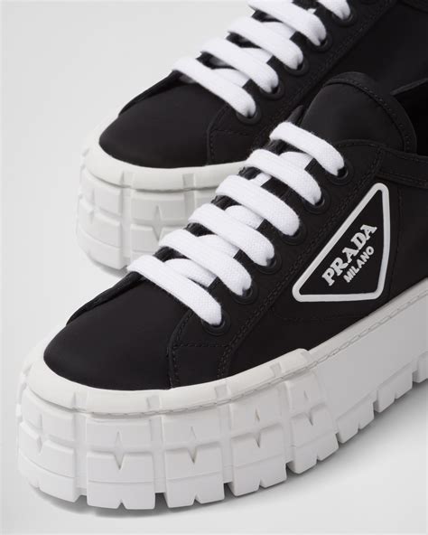 prada double wheel sneakers black|prada black sneakers men.